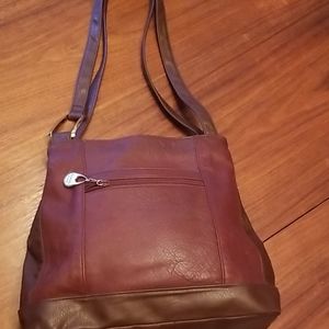 Smart and sassy vintage Carriage House leather